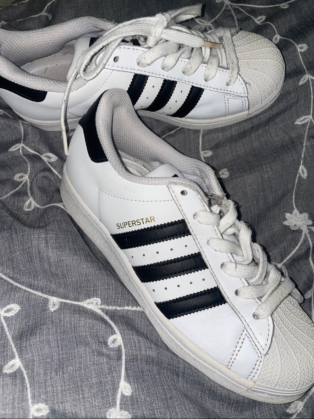 White and Black Adidas Superstar Low-Top Sneakers